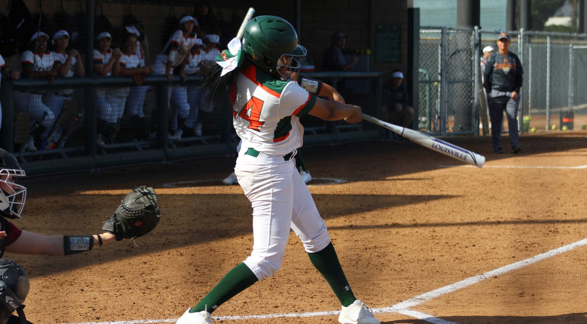 Softball sweeps Oxy, takes command of first place