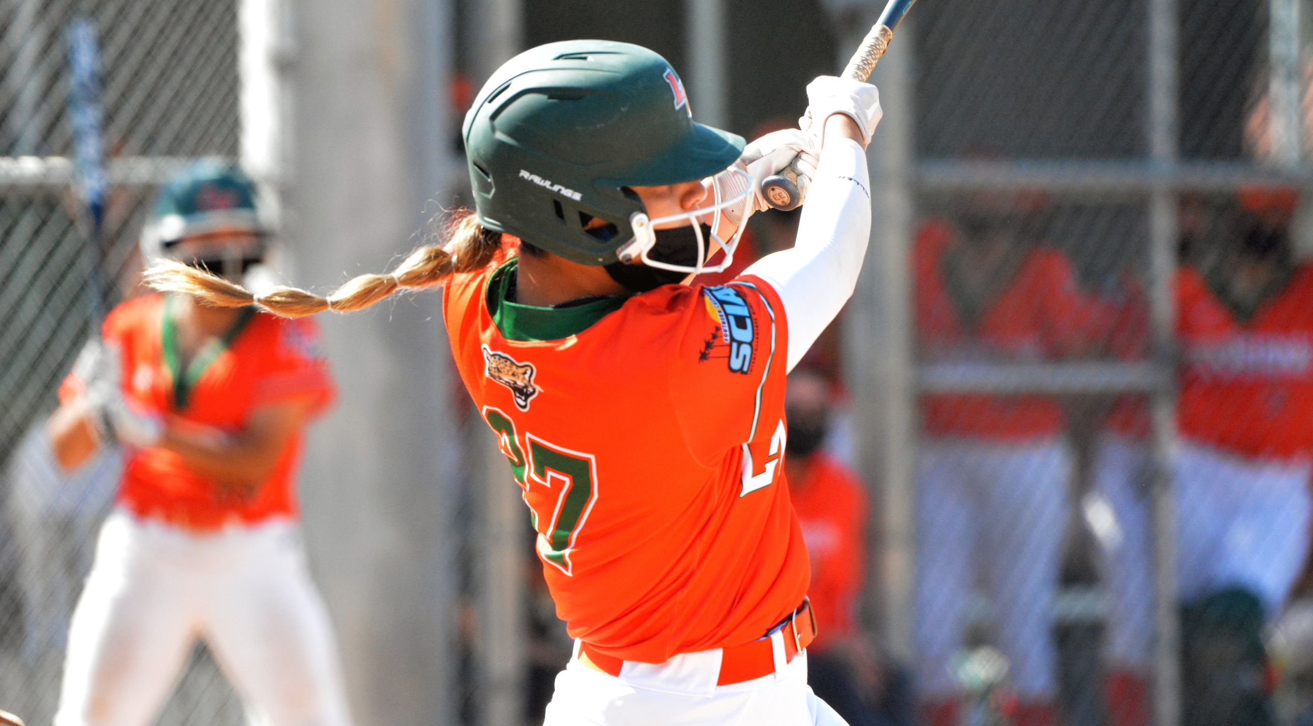 Jaylene Jaloma blasts a double at Chapman in the opening round of the SCIAC Tournament.
