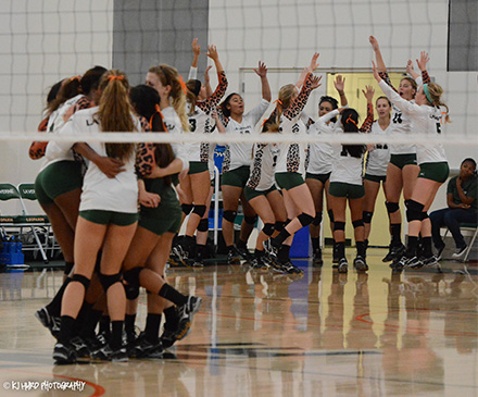 Leopards Volleyball celebrates after defeating No. 6 Colorado College (photo by Kay Hurd)